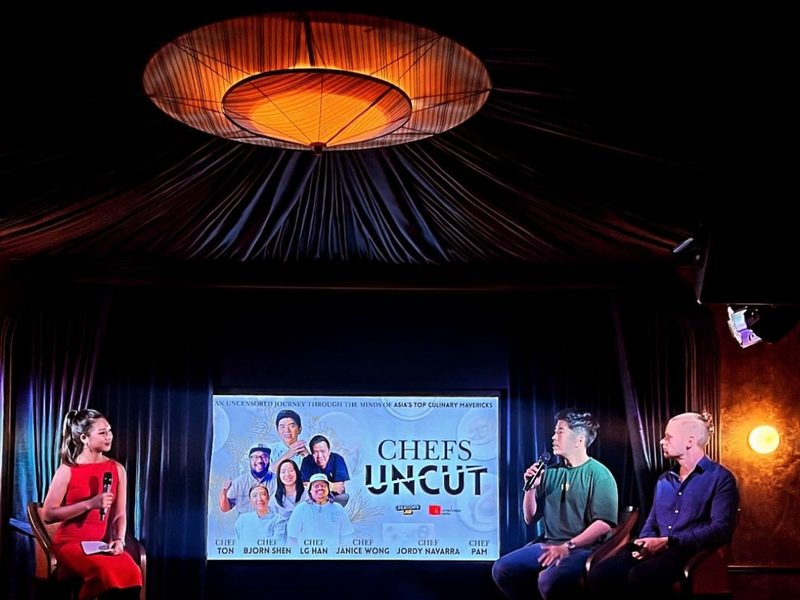 Emcee hosting an international panel discussion