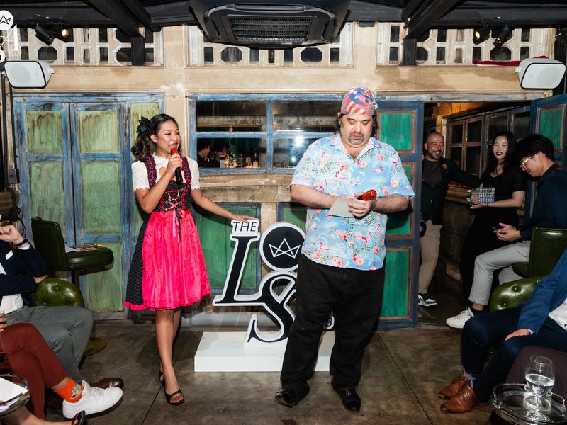 Emcee hosting an outdoor wedding at night
