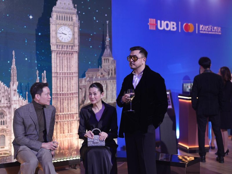 Guests at the UOB Privilege Banking activation in front of the landmark backdrop